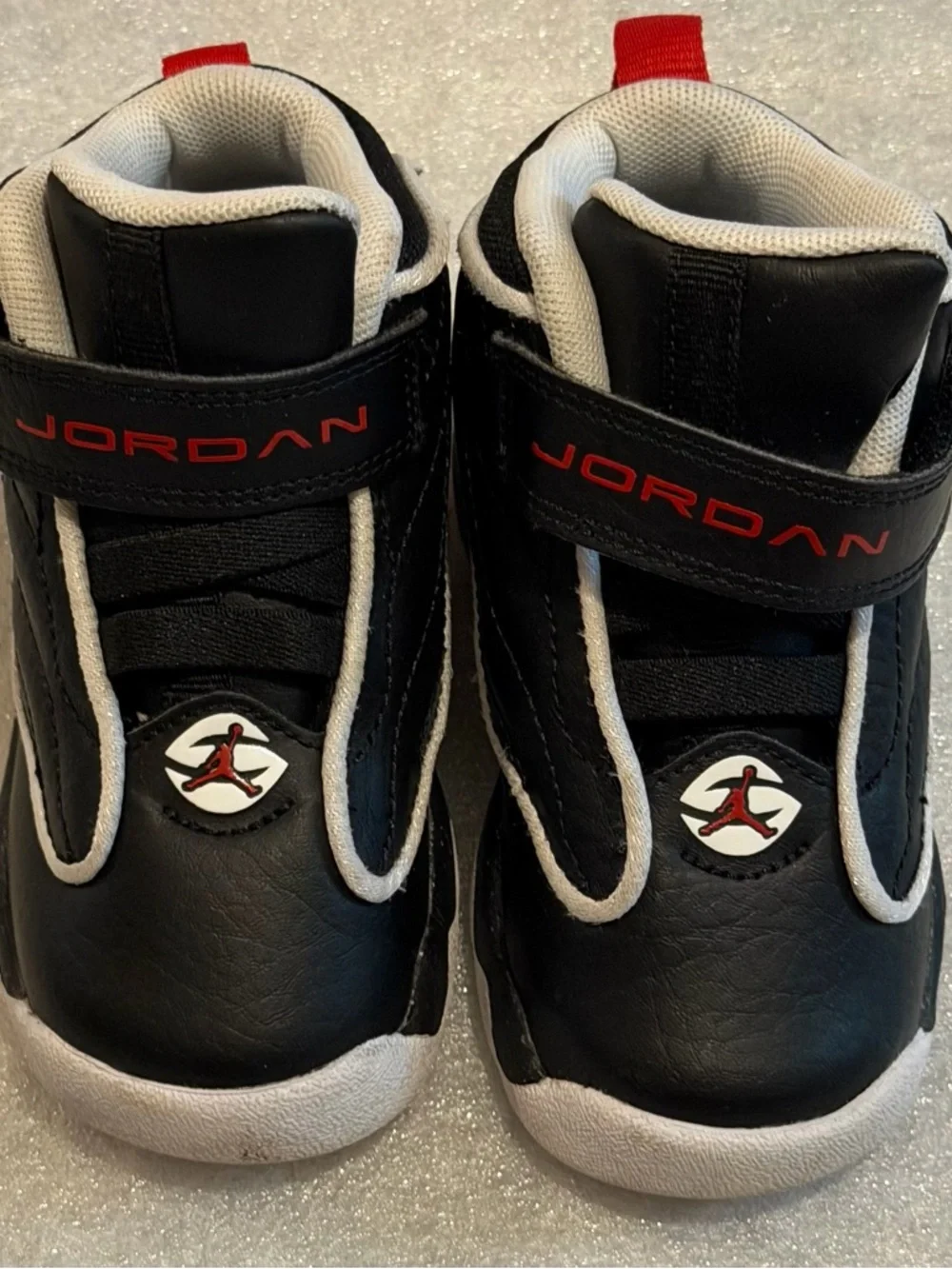 Jordan Kids Black and Red High-Top Sneakers with White Trim size 6C